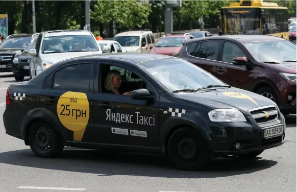 ?? Gleb Garanich / Reuters ?? Uber’s new partner Yandex.Taxi, which was founded in 2011, is active in 127 cities across eastern Europe