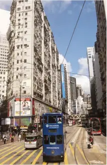  ??  ?? ABOVE The trams in Central have been in operation since the colonial period. TOP Traditiona­l junks still sail in Victoria Harbour. OPPOSITE View of the city from The Peak.