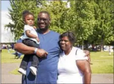  ?? RICK KAUFFMAN – DIGITAL FIRST MEDIA ?? Tramaine Hobson, right, with husband, Rashad Hobson, center, and daughter Zoey, left, benefitted from the services provided by the Nurse-Family Partnershi­p.