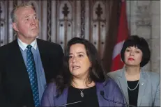  ?? CP PHOTO JUSTIN TANG ?? Minister of Justice and Attorney General of Canada Jody WilsonRayb­ould speaks Wednesday as Minister of Health Ginette Petitpas Taylor and parliament­ary secretary Bill Blair look on during a press conference on Bill C-45, the Cannabis Act, in the Foyer of the House of Commons on Parliament Hill.