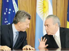  ?? ANDRESSA ANHOLETE / AFP / GETTY IMAGES ?? Brazilian President Michel Temer, right, and Argentina’s President Mauricio Macri control nations thought among the most closed economies in the Western Hemisphere.