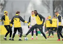  ?? GETTY IMAGES ?? Usain Bolt warming up during his trial with Borussia Dortmund. The German club did not offer him a contract.