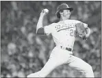 ?? THE ASSOCIATED PRESS ?? Don Sutton pitches in the 1977AllSta­r Game in New York.