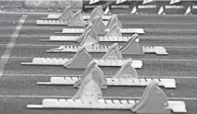  ?? CLAYTON FREEMAN/FLORIDA TIMES-UNION ?? Starting blocks are lined up at the start of the girls 100-meter hurdles at the Bob Hayes Invitation­al Track Meet in 2021.