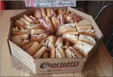  ?? DONNA ROVINS — MEDIANEWS GROUP ?? A catering order of Capriotti’s sandwiches. The restaurant is known for its fresh roasted turkey, and meats that are sliced daily.