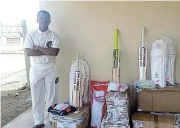  ?? Picture: SUPPLIED ?? GREAT CATCH: Spartans Sports Club player Lutho Hadi, with the equipment donated for the newly-formed Spartans Sports Club teams. The teams are looking forward to the upcoming season