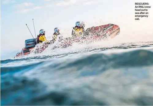  ??  ?? RESCUERS: An RNLI crew head out to sea after an emergency call.