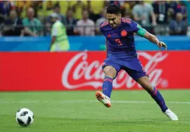  ??  ?? Falcao scores Colombia’s second goal in their victory against Poland