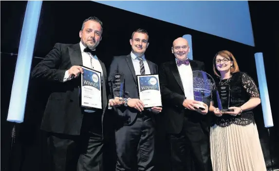  ?? Tom Martin/Wales News Service ?? > Steve Dimmick of Doopoll, Llew Davies, head at Ysgol Cae Top, Oggy East and Rebecca Lewis of General Dynamics at last year’s Wales Technology Awards