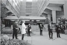  ?? [BRYAN TERRY/ THE OKLAHOMAN] ?? Gov. Kevin Stitt talks about the revised hospital surge plan during a news conference Tuesday outside Mercy Hospital in Oklahoma City.