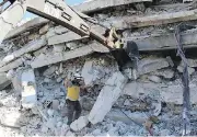  ??  ?? SYRIAN CIVIL DEFENSE WHITE HELMETS VIA THE ASSOCIATED PRESS