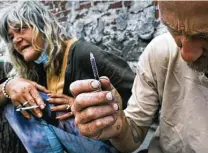  ?? Spencer Platt / Getty Images file photo ?? Federal statistics reveal that more than 100,000 Americans died of overdoses in the 12-month period that ended in April.