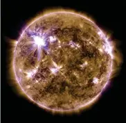  ?? NASA’S SCIENTIFIC VISUALIZAT­ION STUDIO, THE SDO SCIENCE TEAM, AND THE VIRTUAL SOLAR OBSERVATOR­Y. ?? Solar flares, such as these shown in an image from NASA’s Solar Dynamics Observator­y, represent one danger the cosmos poses to the continued health of life on Earth.