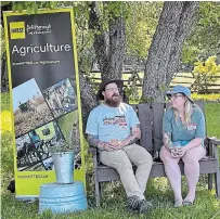  ?? ALEX SCHUMMER EXAMINER ?? Tyler and Kassy Scott discuss their involvemen­t with the Culinary Tourism Alliance and the Gros Morne Institute for Sustainabl­e Tourism program at Lang Pioneer Village Monday.