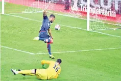  ?? - AFP photo ?? Dijon’s French defender Mickael Alphonse scores a goal during the French L1 football match AS Monaco FC vs Dijon FCO at the Louis II Stadium in Monaco on October 27, 2018.