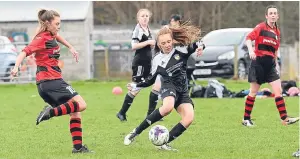  ?? Pictures: Stuart Cowper. ?? Above: Action from Jeanfield Swifts Developmen­t’s 6-4 win over Bonnyrigg Rose with, top, Abbie Ferguson scoring and Tara Laughlin getting in a shot at goal.