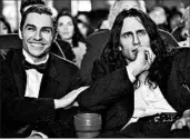  ?? MPAA rating: Running time: A24 ?? Dave Franco, left, plays Greg Sestero and James Franco plays Tommy Wiseau in a film about the making of “The Room,” a memorably bad movie made by and starring Wiseau and co-starring Sestero.
R (for language throughout and some sexuality/nudity) 1:45
