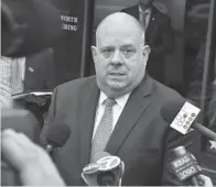  ??  ?? Gov. Larry Hogan speaks to the media after the debate.