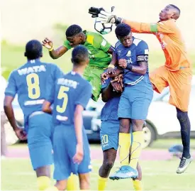  ??  ?? Hydel High School goalkeeper Shaquan Davis (right) leaps for a ball the Walker Cup final against Excelsior High School at the Stadium East field last season.