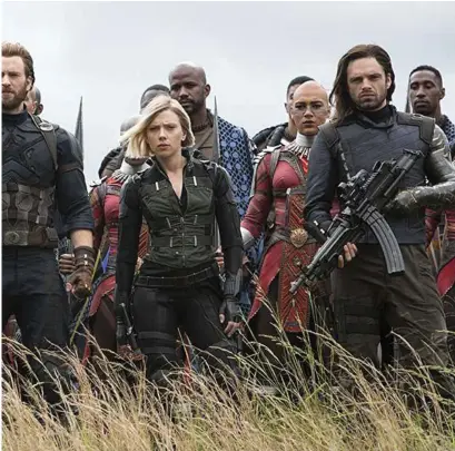  ?? Marvel Studios ?? Chris Evans, Scarlett Johansson, Chadwick Boseman, Sebastian Stan, Danai Gurira, Marie Mouroum, and Winston Duke in “Avengers: Infinity War.”