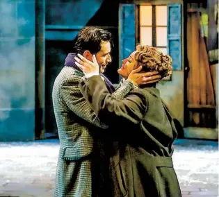  ?? COURTESY PHOTO ?? Tenor Joshua Guerrero as Rodolfo (pictured with Julie Adams as Mimi) in Des Moines Metro Opera’s 2019 production of “La bohème.”