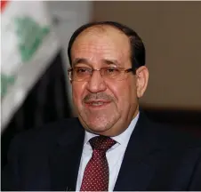  ??  ?? Iraqi prime minister Haider Al Abadi, left, and vice president Nouri Al Maliki, right, are both members of the Dawa party, but will oppose each other in the upcoming parliament­ary election