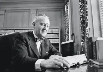  ?? Associated Press 1976 ?? Justice John Paul Stevens looks over some legal material on Jan. 12, 1976, in his chambers before joining his colleagues for his first working session on the Supreme Court bench.