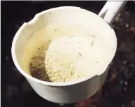  ?? Ned Gerard / Hearst Connecticu­t Media file photo ?? A sample of water with mosquito larvae, taken in the woods near Eisenhower Park in Milford in 2017. This year, mosquitoes with West Nile virus have been detected in at least eight communitie­s — most recently, Bridgeport.