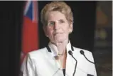  ?? CHRIS YOUNG LA PRESSE CANADIENNE ?? La première ministre de l’Ontario, Kathleen Wynne, exhorte Tim Hortons à s’en prendre à elle plutôt qu’aux employés.