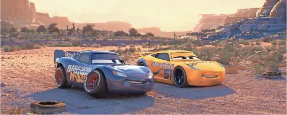 ?? PHOTOS BY PIXAR ?? Lightning McQueen (Owen Wilson) and Cruz Ramirez (Cristela Alonzo) get new paint jobs that pay homage to Doc Hudson (Paul Newman) at the end of Cars 3.