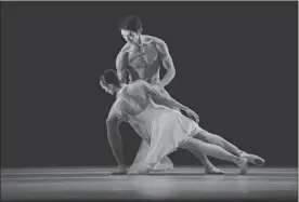  ?? CONRAD DY-LIACCO ?? Jin Yao and William Lin of the Hong Kong Ballet in Luminous by Peter Quanz. While Chinese training is ideal for classical repertory, interactio­n between dancers is harder to teach.