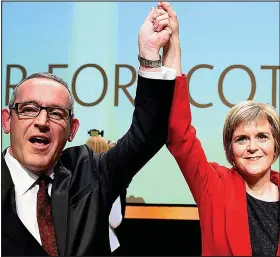  ??  ?? Support role: Mr Hosie with then new SNP leader Miss Sturgeon in 2014