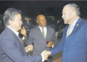  ??  ?? Jamaican Senator Aubyn Hill (centre) introduced Toronto-based physician and husband of Dr Gloria Moodie Dr Peter Wong (left) to the president of the Jamaican Senate Tom Tavares-finson.