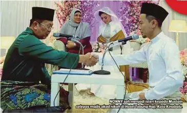  ??  ?? NONNY sah menjadi isteri kepada Mustain selepas majlis akad nikah di Hotel Tabung Haji, Kota Kinabalu.