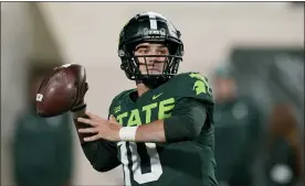  ?? CARLOS OSORIO — THE ASSOCIATED PRESS ?? Michigan State quarterbac­k Payton Thorne throws during the second half of a college football game against Maryland on Nov. 13in East Lansing.