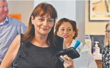  ??  ?? Townsville Mayor Jenny Hill and Deputy Premier Jackie Trad arrive to meet with insurers yesterday. Picture: ZAK SIMMONDS