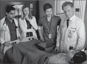  ??  ?? Fox’s new medical drama, The Resident, stars (from left) Manish Dayal, Emily VanCamp, Matt Czuchry and Bruce Greenwood. The series debuts at 9 p.m. today following the NFC Championsh­ip game.