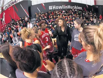  ?? COURTESY BOSTON UNIVERSITY ?? TALKING POINTS: BU women’s basketball coach Marisa Moseley talks to her players during a loss to Northeaste­rn on Nov. 9.