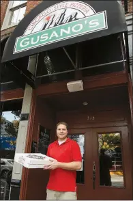  ?? Democrat-Gazette file photo ?? Gusano’s owner Tim Chappell, outside his River Market restaurant in 2008, plans to resurrect The Shack in the pizzeria in coming months.