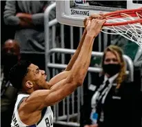  ?? Morry Gash / Associated Press ?? Two-time reigning MVP Giannis Antetokoun­mpo joins Team Lebron after facing James the past three All-star games.