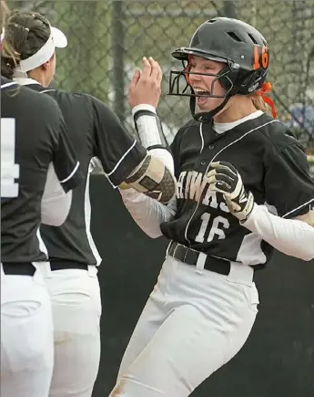  ?? Peter Diana/Post-Gazette ?? Bethel Park's Reagan Milliken, pictured celebratin­g with her teammates after hitting a home run vs. Canon-McMillan on April 16, is an Ohio State recruit emerging as one of the most feared sluggers in the WPIAL.
