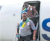  ?? Photo: Solomon Star ?? Solomon Islands Attorney-General James Apaniai and Permanent Secretary of Ministry of Communicat­ion and Aviation, Moses Virivolomo disembarki­ng at Manaoba airfield in North East Malaita on July 20, 2018.