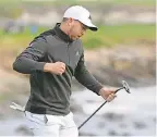  ?? EZRA SHAW/ GETTY IMAGES ?? Daniel Berger celebrates his eagle putt to win on the 18th green Sunday.