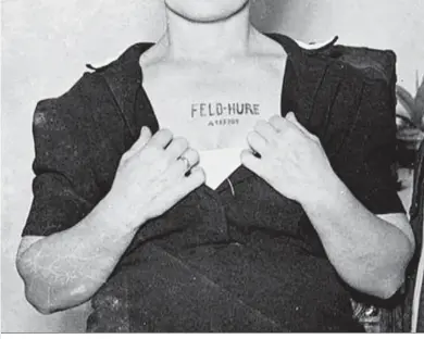  ?? ?? Una reclusa con el tatuaje de ‘Feld-hure’, término que significa prostituta de campo de concentrac­ión.