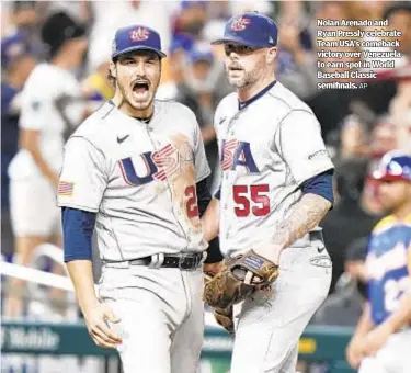  ?? AP ?? Nolan Arenado and Ryan Pressly celebrate Team USA’s comeback victory over Venezuela to earn spot in World Baseball Classic semifinals.