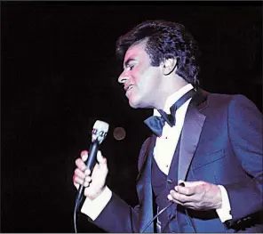  ?? Sony/Columbia Archives ?? Known for music, Johnny Mathis, shown here in the 1980s, is also quite the golfer and cook.