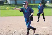  ?? JESSICA NYZNIK/EXAMINER ?? Vinnie’s pitcher Vivien Knott tosses the ball during Peterborou­gh Senior Ladies Slo-Pitch League season opener at George (Red) Sullivan East City Bowl on Wednesday morning.