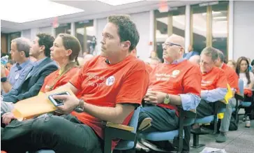  ?? MICHAEL LAUGHLIN/STAFF PHOTOGRAPH­ER ?? Supporters of the Bahia Mar redevelopm­ent proposal attend a public hearing at Fort Lauderdale City Hall on Tuesday.