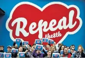  ??  ?? Pro-choice: People in Dublin campaignin­g for the repeal of the Irish law on abortion