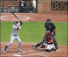  ?? Associated Press ?? The pitch clock is seen as Minnesota Twins’ Max Kepler takes an at-bat during the second inning of a baseball game against the Baltimore Orioles on July 1 in Baltimore.